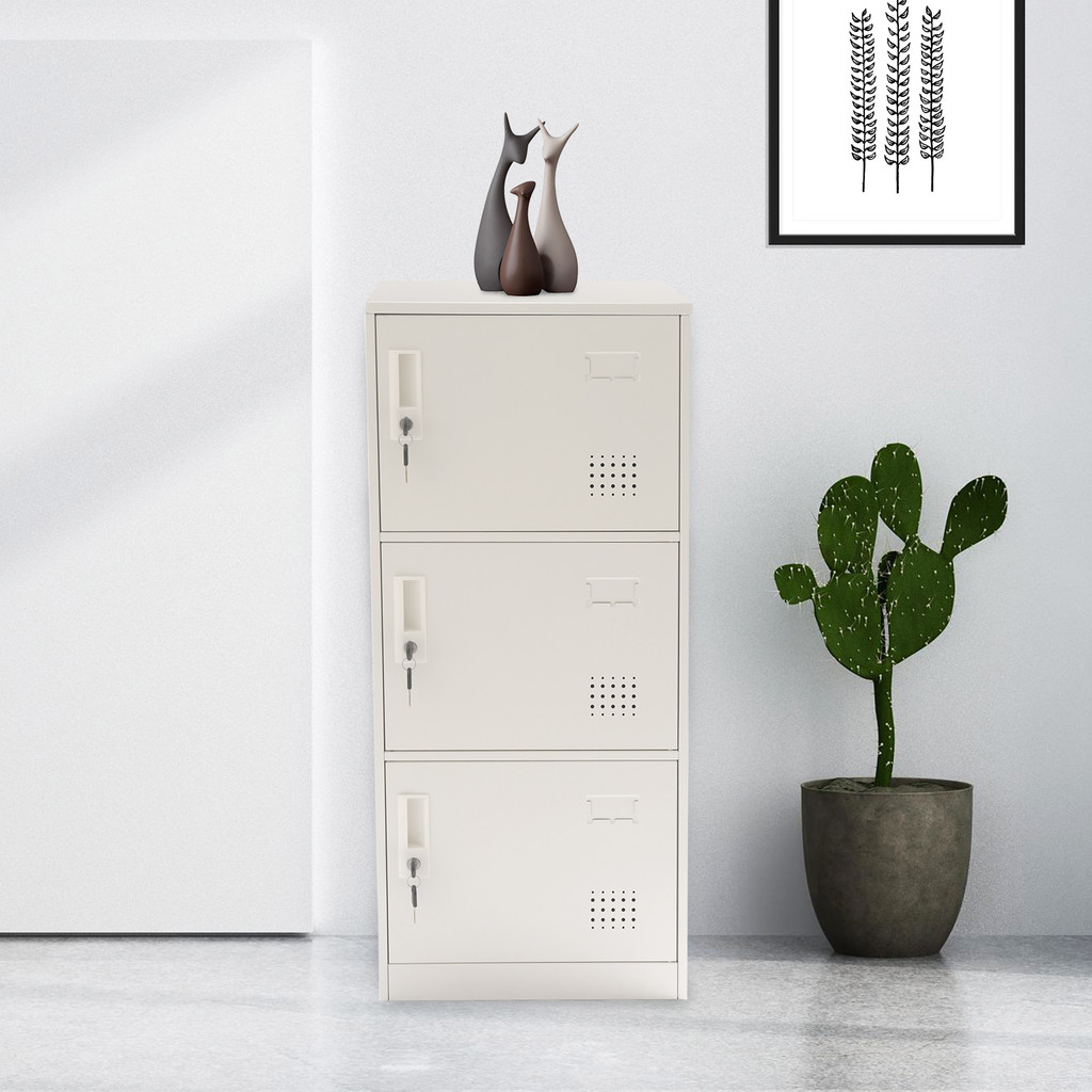 White 3-drawer metal filing cabinet with plant next to it and decorative vases on top